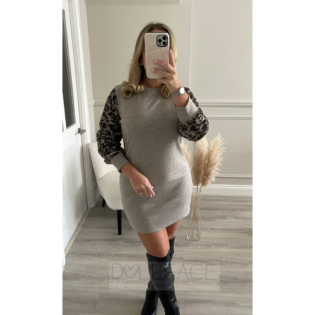 jumper dress with sequin sleeves Get cosy and shine bright in the Soren Black Sequin Sleeve Jumper Dressyour new fave for glittering nights out! Shop Now: www.getthattrend.com/products/soren-black-sequin-sleeve-jumper-dress